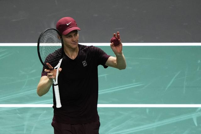 Italy's Jannik Sinner celebrates after winning against US Ben Shelton at the end of their men's singles quarter-final match on day five of the Paris ATP Masters 1000 tennis tournament at the Paris La Défense Arena in Nanterre, on the outskirts of Paris, on October 31, 2025. (Photo by Dimitar DILKOFF / AFP)