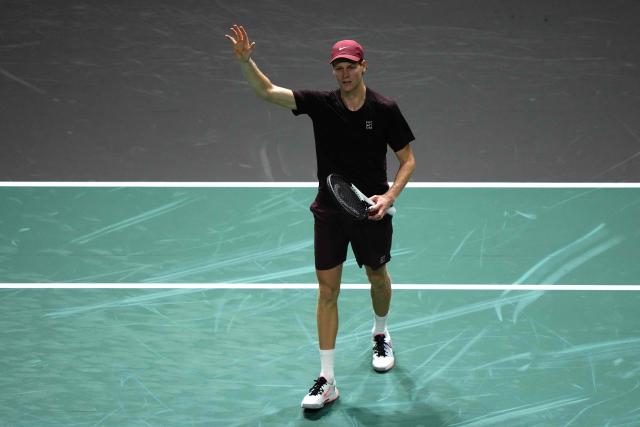 Italy's Jannik Sinner celebrates after winning against US Ben Shelton at the end of their men's singles quarter-final match on day five of the Paris ATP Masters 1000 tennis tournament at the Paris La Défense Arena in Nanterre, on the outskirts of Paris, on October 31, 2025. (Photo by Dimitar DILKOFF / AFP)