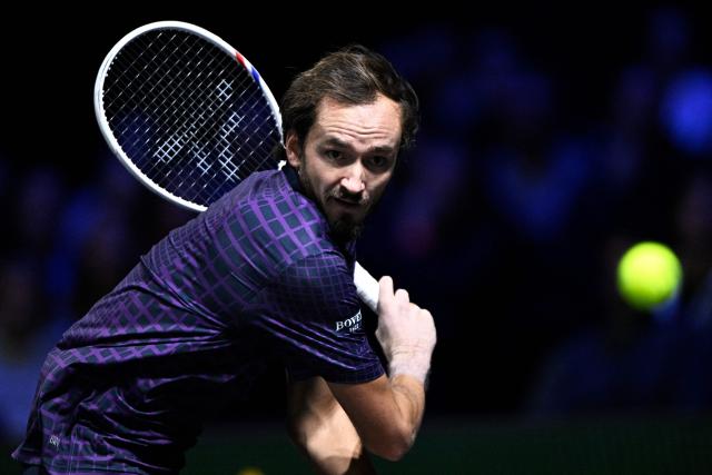 Russia's Daniil Medvedev eyes the ball as he plays against Germany's Alexander Zverev during their men's singles quarter-final match on day five of the Paris ATP Masters 1000 tennis tournament at the Paris La Défense Arena in Nanterre, on the outskirts of Paris, on October 31, 2025. (Photo by JULIEN DE ROSA / AFP)