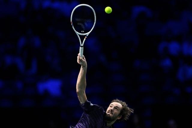 Russia's Daniil Medvedev hits an overhead smash to Germany's Alexander Zverev during their men's singles quarter-final match on day five of the Paris ATP Masters 1000 tennis tournament at the Paris La Défense Arena in Nanterre, on the outskirts of Paris, on October 31, 2025. (Photo by JULIEN DE ROSA / AFP)