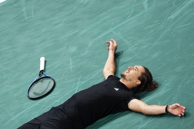 Germany's Alexander Zverev celebrates after winning against Russia's Daniil Medvedev at the end of their men's singles quarter-final match on day five of the Paris ATP Masters 1000 tennis tournament at the Paris La Défense Arena in Nanterre, on the outskirts of Paris, on October 31, 2025. (Photo by Dimitar DILKOFF / AFP)