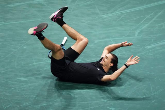 Germany's Alexander Zverev celebrates after winning against Russia's Daniil Medvedev at the end of their men's singles quarter-final match on day five of the Paris ATP Masters 1000 tennis tournament at the Paris La Défense Arena in Nanterre, on the outskirts of Paris, on October 31, 2025. (Photo by Dimitar DILKOFF / AFP)