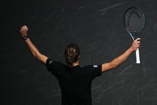 Germany's Alexander Zverev celebrates after winning against Russia's Daniil Medvedev at the end of their men's singles quarter-final match on day five of the Paris ATP Masters 1000 tennis tournament at the Paris La Défense Arena in Nanterre, on the outskirts of Paris, on October 31, 2025. (Photo by Dimitar DILKOFF / AFP)