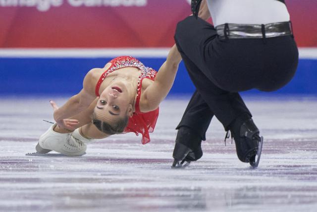 Oxana Vouillamoz and Tom Bouvart of Switzerland skate in the pairs competition during the ISU Grand Prix of Figure Skating 2025 Skate Canada International at the SaskTel Centre in Saskatoon, Saskatchewan, Canada on October 31, 2025. (Photo by Geoff Robins / AFP)
