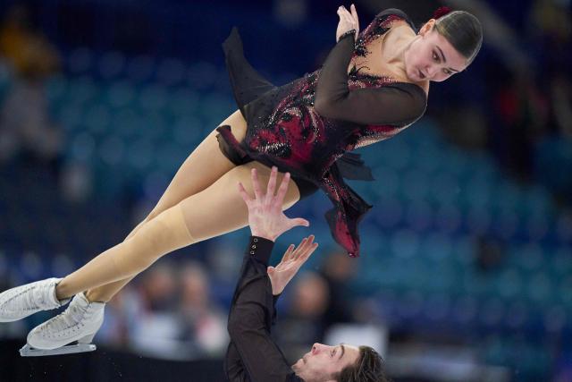 Kelly Ann Laurin and Loucas Ethier of Canada skate in the pairs competition during the ISU Grand Prix of Figure Skating 2025 Skate Canada International at the SaskTel Centre in Saskatoon, Saskatchewan, Canada on October 31, 2025. (Photo by Geoff Robins / AFP)