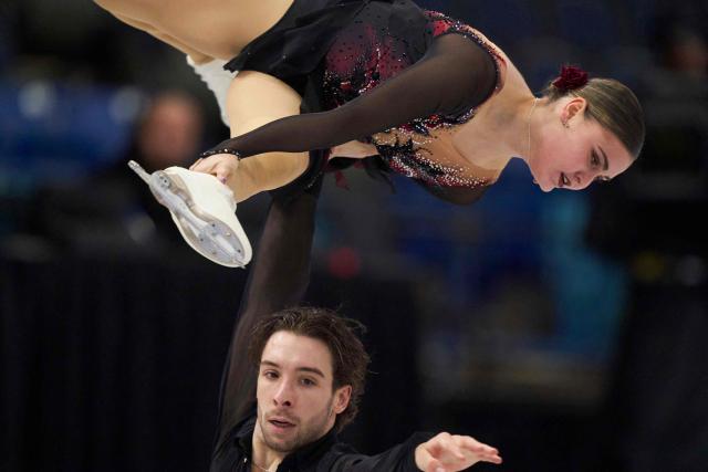 Kelly Ann Laurin and Loucas Ethier of Canada skate in the pairs competition during the ISU Grand Prix of Figure Skating 2025 Skate Canada International at the SaskTel Centre in Saskatoon, Saskatchewan, Canada on October 31, 2025. (Photo by Geoff Robins / AFP)