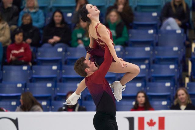 Lia Pereira and Trennt Michaud of Canada skate in the pairs competition during the ISU Grand Prix of Figure Skating 2025 Skate Canada International at the SaskTel Centre in Saskatoon, Saskatchewan, Canada on October 31, 2025. (Photo by Geoff Robins / AFP)