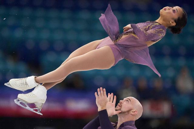 Ellie Kam and Danny O'Shea of the United States skate in the pairs competition during the ISU Grand Prix of Figure Skating 2025 Skate Canada International at the SaskTel Centre in Saskatoon, Saskatchewan, Canada on October 31, 2025. (Photo by Geoff Robins / AFP)