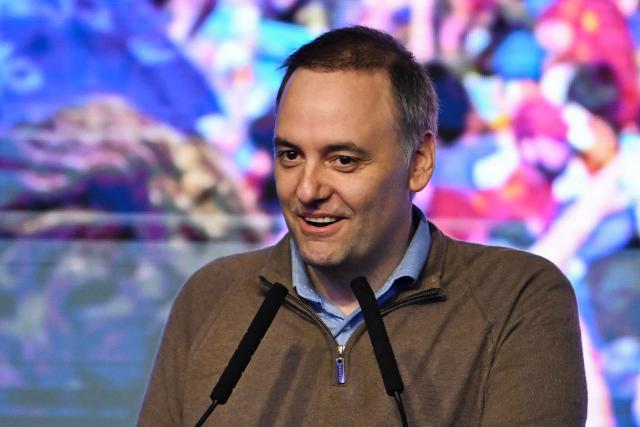 Spokesperson for the Presidency Manuel Adorni speaks at the ruling party's La Libertad Avanza headquarters following the results of the national midterm legislative election in Buenos Aires on October 26, 2025. Argentine President Javier Milei appointed his spokesperson Manuel Adorni as the new Cabinet Chief on October 31, and is planning further changes to his team as part of a relaunch of his administration following his victory in the midterm elections. (Photo by Luis ROBAYO / AFP)