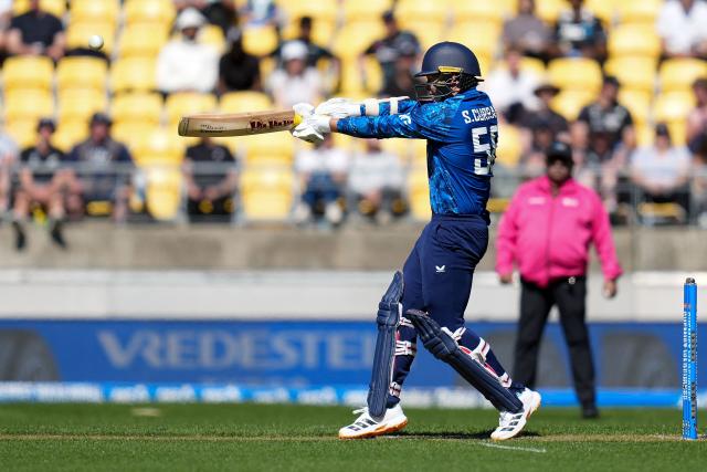 England Sam Curran plays a shot during the 3rd ODI cricket match between New Zealand and England at Sky Stadium in Wellington on November 1, 2025. (Photo by Marty MELVILLE / AFP)