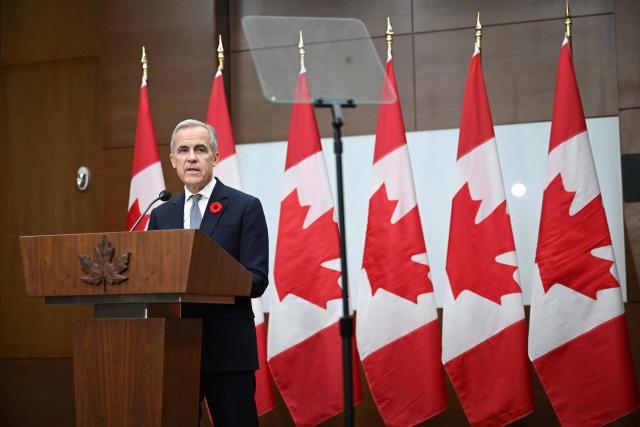 Canada's Prime Minister Mark Carney speaks during a press conference after the 2025 Asia-Pacific Economic Cooperation (APEC) Economic Leaders' Meeting in Gyeongju on November 1, 2025. (Photo by JUNG Yeon-je / AFP)