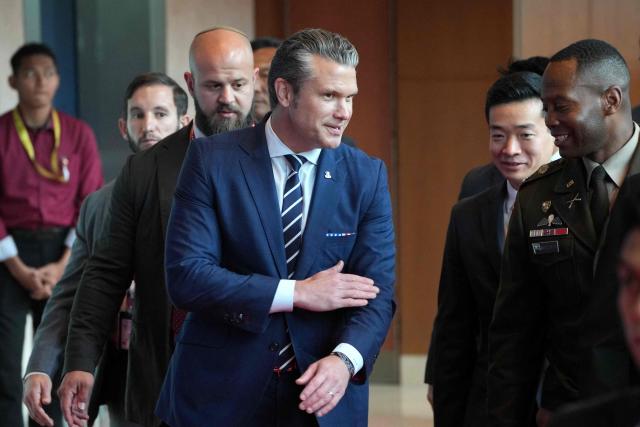 US Secretary of Defense Pete Hegseth (C) walks to attend a ministerial lunch at the Association of Southeast Asian Nations (ASEAN) Defence Ministers' Meeting in Kuala Lumpur on November 1, 2025. (Photo by Dita ALANGKARA / POOL / AFP)