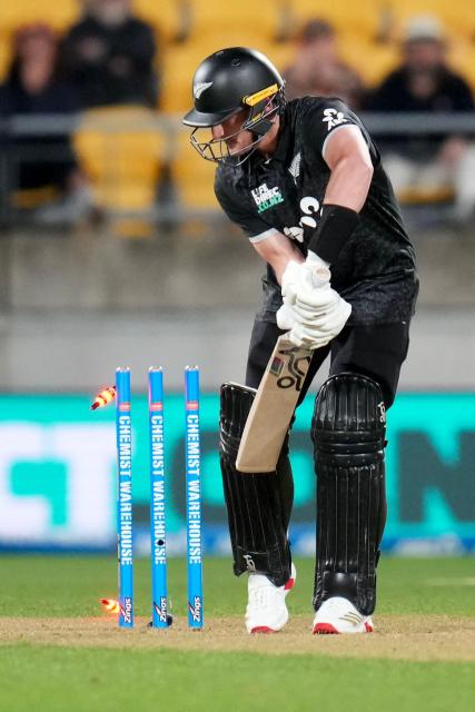 New Zealand's Nathan Smith is bowled during the third one-day international (ODI) cricket match between New Zealand and England at Sky Stadium in Wellington on November 1, 2025. (Photo by Marty MELVILLE / AFP)