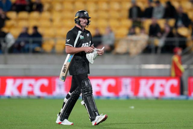 New Zealand's Nathan Smith walks from the field after being bowled during the third one-day international (ODI) cricket match between New Zealand and England at Sky Stadium in Wellington on November 1, 2025. (Photo by Marty MELVILLE / AFP)