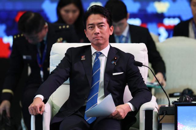 Japan's Defence Minister Shinjiro Koizumi looks on during the ASEAN-Japan Defence Ministers' Informal Meeting at the Association of Southeast Asian Nations (ASEAN) Defence Ministers' Meeting in Kuala Lumpur on November 1, 2025. (Photo by FAZRY ISMAIL / POOL / AFP)