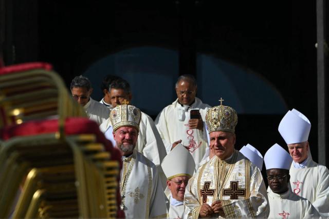 Bishops arrive to attend the Holy mass and Angelus prayer on All Saints' Day at St. Peter's square, in The Vatican on November 1, 2025. (Photo by Andreas SOLARO / AFP)