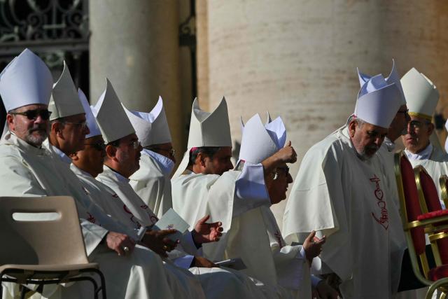 Bishops arrive to attend the Holy mass and Angelus prayer on All Saints' Day at St. Peter's square, in The Vatican on November 1, 2025. (Photo by Andreas SOLARO / AFP)