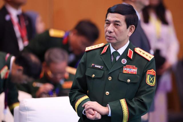 Vietnam's Defence Minister Phan Van Giang attends the ASEAN - United States Defence Ministers Hi-Tea at the Association of Southeast Asian Nations (ASEAN) Defence Ministers' Meeting in Kuala Lumpur on November 1, 2025. (Photo by Hasnoor Hussain / POOL / AFP)