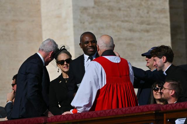 Britain's Justice Secretary and deputy Prime Minister David Lammy (C) arrives to attend the Solemnity of All Saints with the Rite of Proclamation of Saint John Henry Newman as a "Doctor of the Church" on the occasion of the Jubilee of the World Education on All Saints' Day at St. Peter's square, in The Vatican on November 1, 2025. (Photo by Andreas SOLARO / AFP)