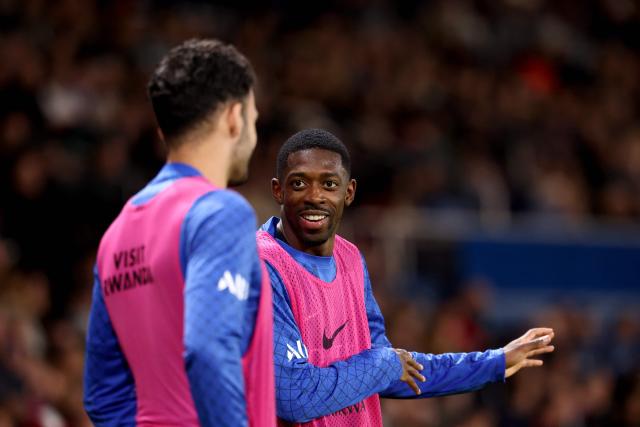 Paris Saint-Germain's French forward #10 Ousmane Dembele warms up during the French L1 football match between Paris Saint-Germain (PSG) and OGC Nice at the Parc des Princes stadium in Paris on November 1, 2025. (Photo by FRANCK FIFE / AFP)