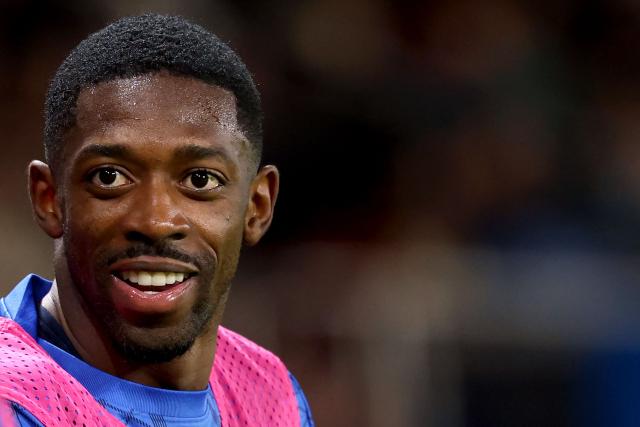 Paris Saint-Germain's French forward #10 Ousmane Dembele warms up during the French L1 football match between Paris Saint-Germain (PSG) and OGC Nice at the Parc des Princes stadium in Paris on November 1, 2025. (Photo by FRANCK FIFE / AFP)