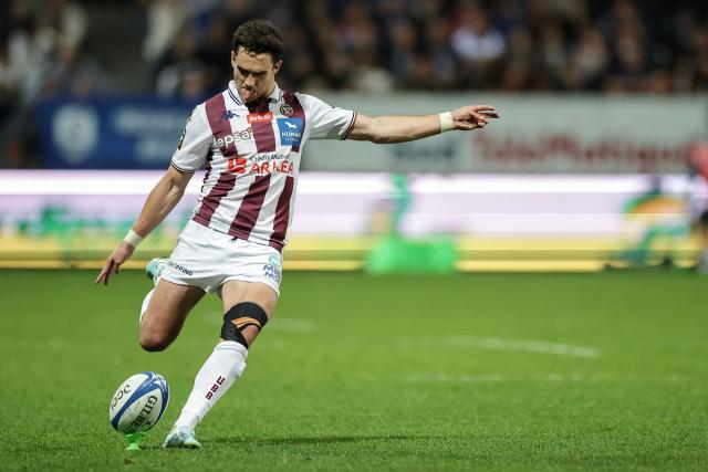 Bordeaux-Begles' French fly-half Joseph Carbery kicks the ball to convert a try during the French Top 14 rugby union match between Castres Olympique and Union Bordeaux-Begles (UBB) at Stade Pierre Fabre in Castres, southern France on November 1, 2025. (Photo by Valentine CHAPUIS / AFP)