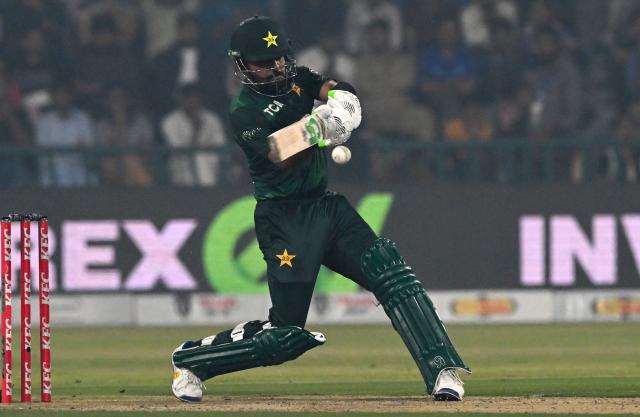 Pakistan's Babar Azam plays a shot during the third and final Twenty20 international cricket match between Pakistan and South Africa at the Gaddafi Stadium in Lahore on November 1, 2025.  (Photo by Farooq NAEEM / AFP)