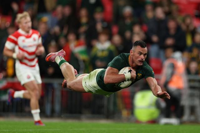 South Africa's centre Jesse Kriel dives over the line to score a try during the Autumn Nations Series international rugby union match between South Africa and Japan at Wembley Stadium in north-west London, on November 1, 2025. (Photo by Adrian Dennis / AFP)