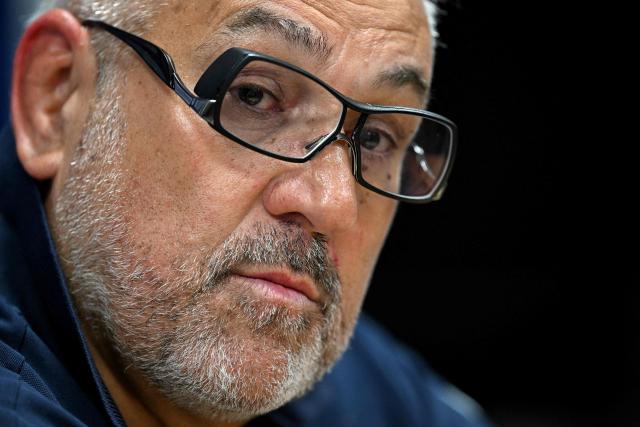 Clermont's French coach Christophe Urios looks on as he delivers remarks during a press conference after the French Top 14 rugby union match between Montpellier Herault Rugby and ASM Clermont Auvergne at the Septeo Stadium in Montpellier, southern France on November 1, 2025. (Photo by GABRIEL BOUYS / AFP)