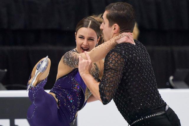 Marie-Jade Lauriault and Romain Le Gac of Canada skate their Rhythm Dance in the Ice Dance event during the ISU Grand Prix of Figure Skating 2025 Skate Canada International at the SaskTel Centre in Saskatoon, Saskatchewan, Canada on November 1, 2025. (Photo by Geoff Robins / AFP)