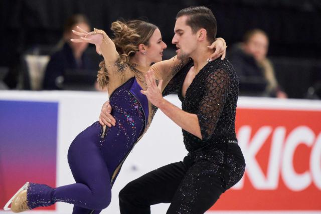 Marie-Jade Lauriault and Romain Le Gac of Canada skate their Rhythm Dance in the Ice Dance event during the ISU Grand Prix of Figure Skating 2025 Skate Canada International at the SaskTel Centre in Saskatoon, Saskatchewan, Canada on November 1, 2025. (Photo by Geoff Robins / AFP)