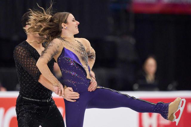 Marie-Jade Lauriault and Romain Le Gac of Canada skate their Rhythm Dance in the Ice Dance event during the ISU Grand Prix of Figure Skating 2025 Skate Canada International at the SaskTel Centre in Saskatoon, Saskatchewan, Canada on November 1, 2025. (Photo by Geoff Robins / AFP)