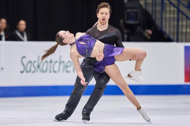 Christina Carreira and Anthony Ponomarenko of the United States skate their Rhythm Dance in the Ice Dance event during the ISU Grand Prix of Figure Skating 2025 Skate Canada International at the SaskTel Centre in Saskatoon, Saskatchewan, Canada on November 1, 2025. (Photo by Geoff Robins / AFP)