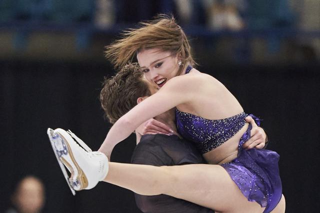 Christina Carreira and Anthony Ponomarenko of the United States skate their Rhythm Dance in the Ice Dance event during the ISU Grand Prix of Figure Skating 2025 Skate Canada International at the SaskTel Centre in Saskatoon, Saskatchewan, Canada on November 1, 2025. (Photo by Geoff Robins / AFP)