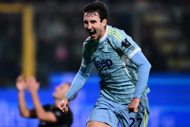Juventus' Italian defender #27 Andrea Cambiaso celebrates after scoring a goal during the Italian Serie A football match between Cremonese and Juventus at the Giovanni Zini Stadium in Cremona on November 1, 2025.  (Photo by MARCO BERTORELLO / AFP)