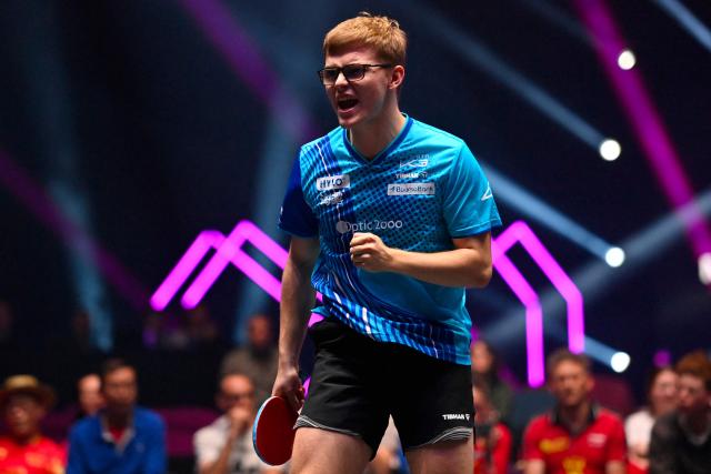 France's Alexis Lebrun reacts as he competes with Slovenia's Darko Jorgic during their men's singles quarter-final table tennis match as part of the World Table Tennis (WTT) Champions Montpellier 2025 at the Sud de France Arena in Perols, near Montpellier, southern France, on November 1, 2025. (Photo by Sylvain THOMAS / AFP)