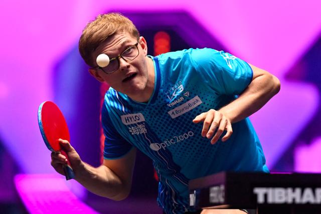 France's Alexis Lebrun eyes the ball as he serves to Slovenia's Darko Jorgic Slovenia's Darko Jorgic during their men's singles quarter-final table tennis match as part of the World Table Tennis (WTT) Champions Montpellier 2025 at the Sud de France Arena in Perols, near Montpellier, southern France, on November 1, 2025. (Photo by Sylvain THOMAS / AFP)