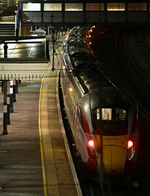 An LNER Azuma train is pictured at a platform at Huntingdon Station in Huntingdon, eastern England, on November 1, 2025, following a stabbing on a train. UK police said they had arrested two suspects Saturday as "a number of people" were taken to hospital after a stabbing on a train in Cambridgeshire, eastern England. "We are currently responding to an incident on a train to Huntingdon where multiple people have been stabbed," British Transport Police said on X, adding that "two people have been arrested". (Photo by JUSTIN TALLIS / AFP)