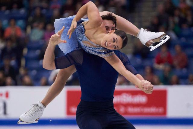 Oxana Vouillamoz and Tom Bouvart of Switzerland skate their free program in the pairs competition during the ISU Grand Prix of Figure Skating 2025 Skate Canada International at the SaskTel Centre in Saskatoon, Saskatchewan, Canada on November 1, 2025. (Photo by Geoff Robins / AFP)