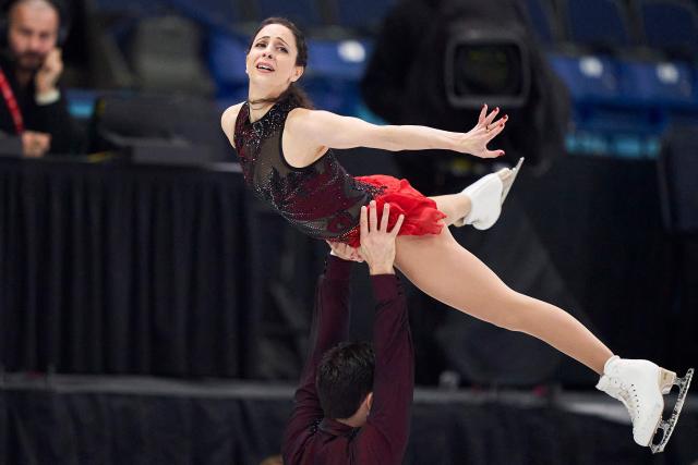 Deanna Stellato-Dudek and Maxime Deschamps of Canada skate their free program in the pairs competition during the ISU Grand Prix of Figure Skating 2025 Skate Canada International at the SaskTel Centre in Saskatoon, Saskatchewan, Canada on November 1, 2025. (Photo by Geoff Robins / AFP)