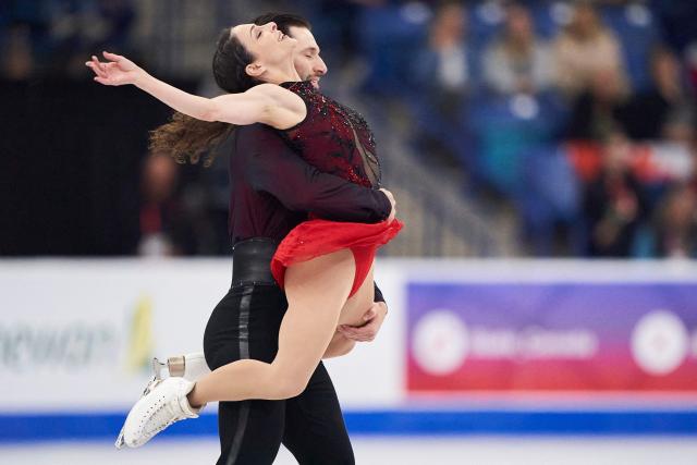 Deanna Stellato-Dudek and Maxime Deschamps of Canada skate their free program in the pairs competition during the ISU Grand Prix of Figure Skating 2025 Skate Canada International at the SaskTel Centre in Saskatoon, Saskatchewan, Canada on November 1, 2025. (Photo by Geoff Robins / AFP)