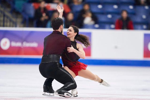 Deanna Stellato-Dudek and Maxime Deschamps of Canada skate their free program in the pairs competition during the ISU Grand Prix of Figure Skating 2025 Skate Canada International at the SaskTel Centre in Saskatoon, Saskatchewan, Canada on November 1, 2025. (Photo by Geoff Robins / AFP)