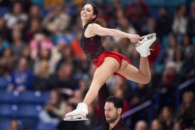 Deanna Stellato-Dudek and Maxime Deschamps of Canada skate their free program in the pairs competition during the ISU Grand Prix of Figure Skating 2025 Skate Canada International at the SaskTel Centre in Saskatoon, Saskatchewan, Canada on November 1, 2025. (Photo by Geoff Robins / AFP)