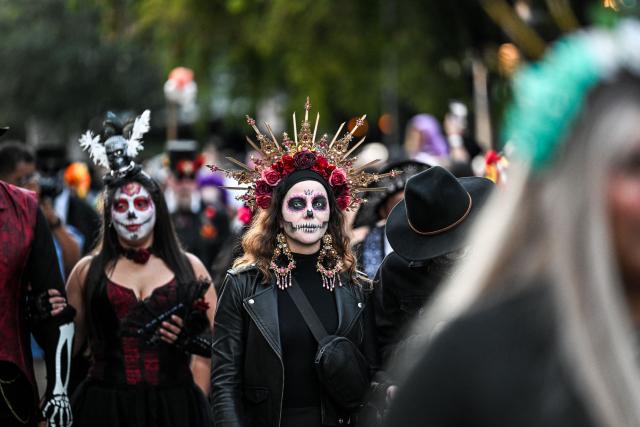Revelers participate in a Dia de los Muertos (Day of the Dead ) celebration in Fort Lauderdale, Florida, on November 1, 2025. (Photo by CHANDAN KHANNA / AFP)