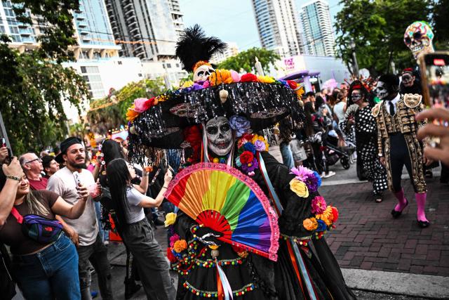 Revelers participate in a Dia de los Muertos (Day of the Dead ) celebration in Fort Lauderdale, Florida, on November 1, 2025. (Photo by CHANDAN KHANNA / AFP)