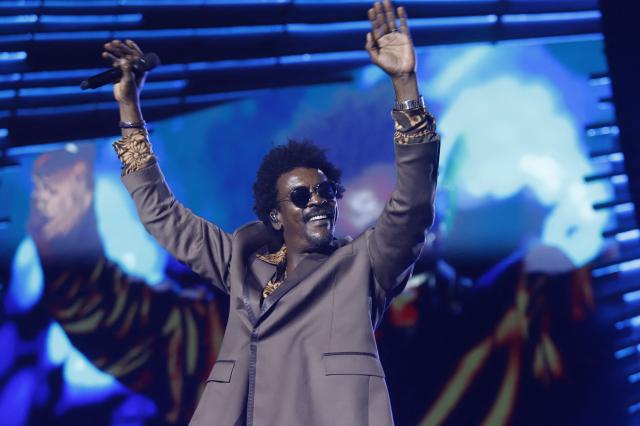 Brazilian singer Seu Jorge performs at the 'Global Citizen Festival: Amazonia' as part of the opening program of the UN COP30 in Belem, Para State, Brazil on November 1, 2025. (Photo by Thiago Gomes / AFP)