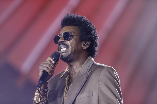 Brazilian singer Seu Jorge performs at the 'Global Citizen Festival: Amazonia' as part of the opening program of the UN COP30 in Belem, Para State, Brazil on November 1, 2025. (Photo by Thiago Gomes / AFP)