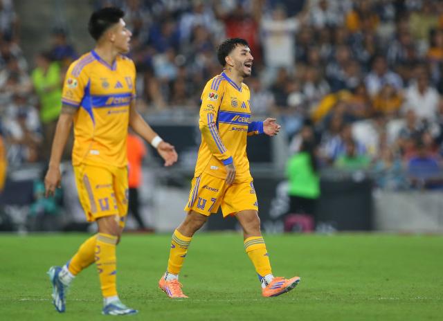 Tigres' Argentine forward #07 Angel Correa celebrates after scoring the equalising goal during the Liga MX Apertura football tournament match between Monterrey and Tigres at BBVA Stadium in Monterrey, Mexico on November 1, 2025. (Photo by Julio Cesar AGUILAR / AFP)