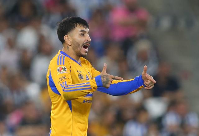 Tigres' Argentine forward #07 Angel Correa celebrates after scoring the equalising goal during the Liga MX Apertura football tournament match between Monterrey and Tigres at BBVA Stadium in Monterrey, Mexico on November 1, 2025. (Photo by Julio Cesar AGUILAR / AFP)