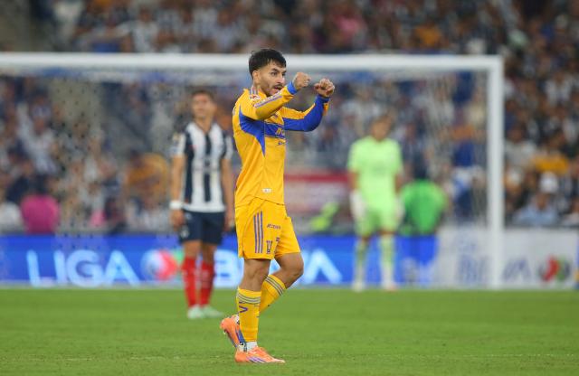 Tigres' Argentine forward #07 Angel Correa celebrates after scoring the equalising goal during the Liga MX Apertura football tournament match between Monterrey and Tigres at BBVA Stadium in Monterrey, Mexico on November 1, 2025. (Photo by Julio Cesar AGUILAR / AFP)